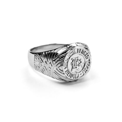 silver ring with nordic pattern, white background