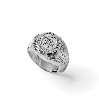 silver ring with nordic pattern, white background